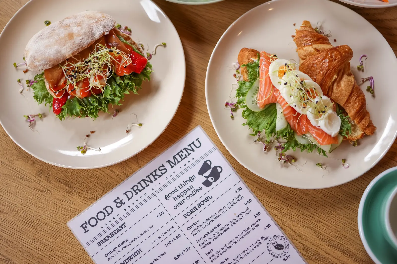 Restaurant food and a printed menu on a table
